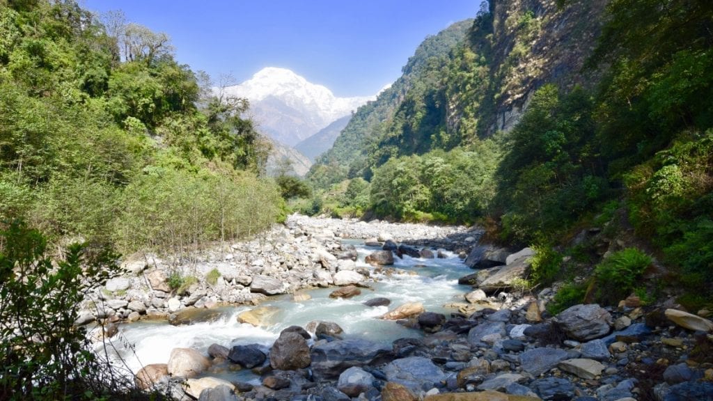 River flowing amid stone in Nepal