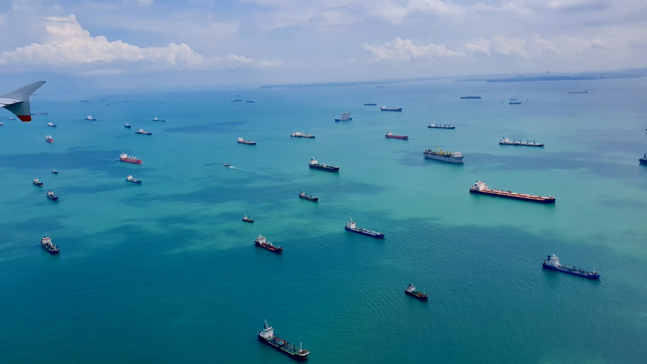 Singapore has a port and it remains  very busy all the time. 