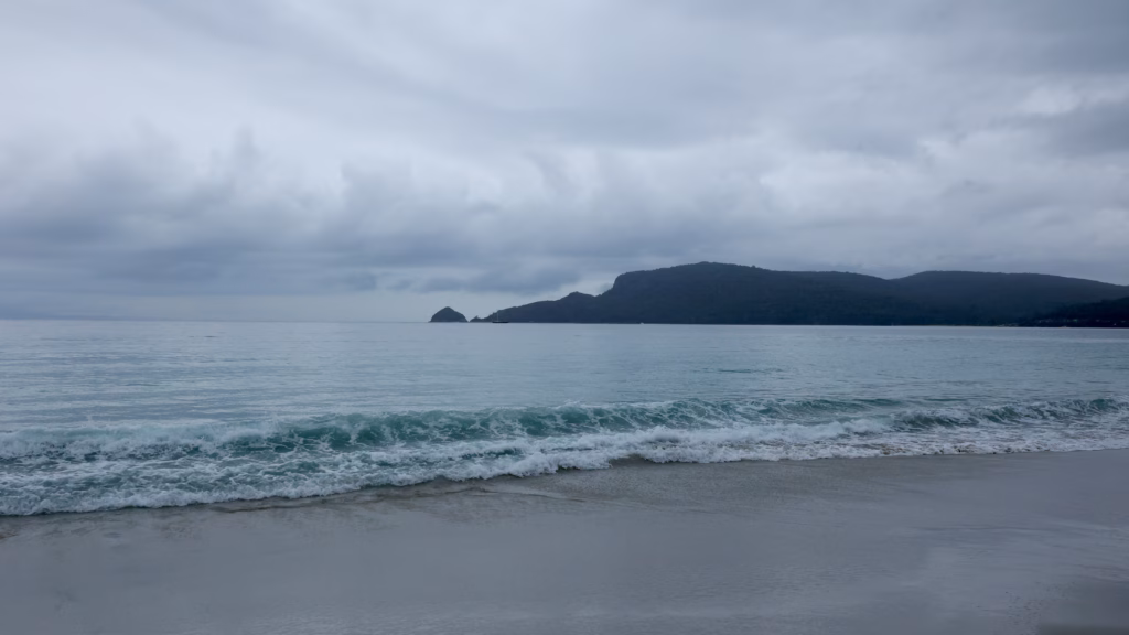 Adventure Bay beach and headland on a cloudy day, Bruny Island, Tasmania
