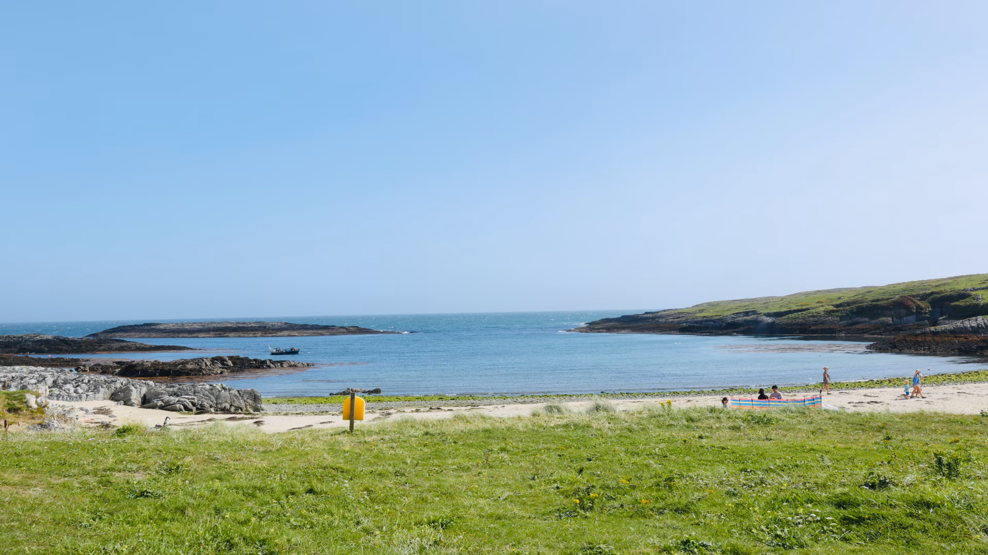 Galley Cove Beach West Cork with clear blue water and sandy shore on a sunny August day