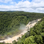 Rainbow in the mist at Barron Falls seen from Skyrail lookout