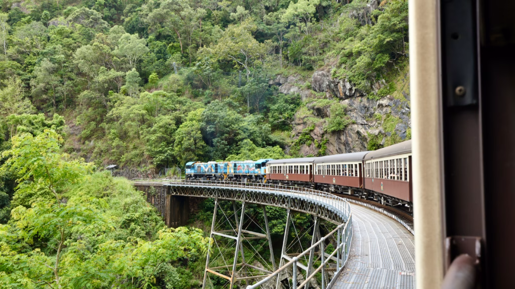 Kuranda Scenic Railway train curving around Jungara Loop trestle bridge