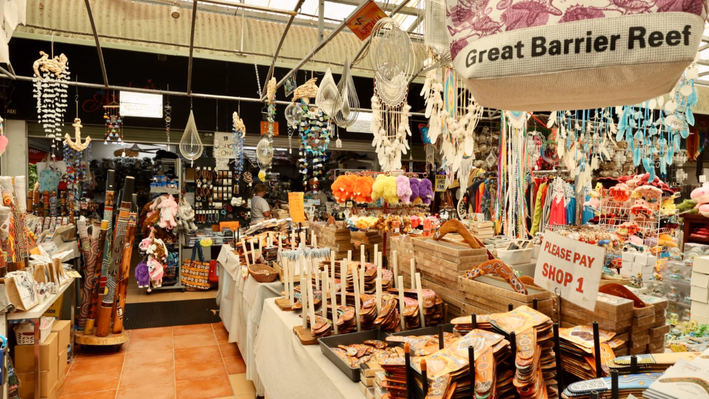 Kuranda market stall with boomerangs, coconut bowls and souvenirs