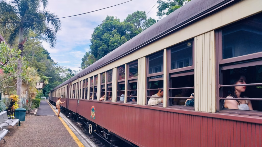 Passengers boarding heritage train at Kuranda Railway Station platform