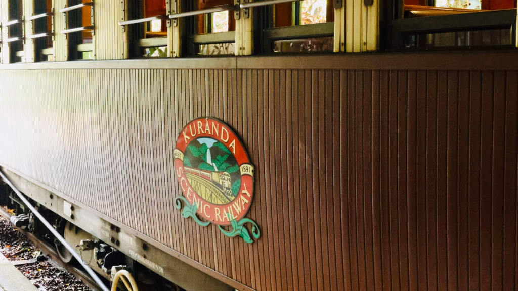 Kuranda Scenic Railway crest on heritage carriage, established 1891