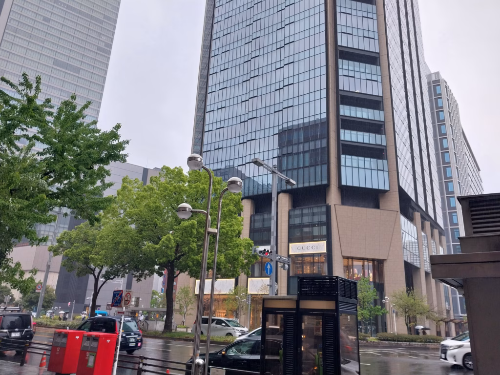 Rainy street in Sakae, Nagoya, with Gucci storefront
