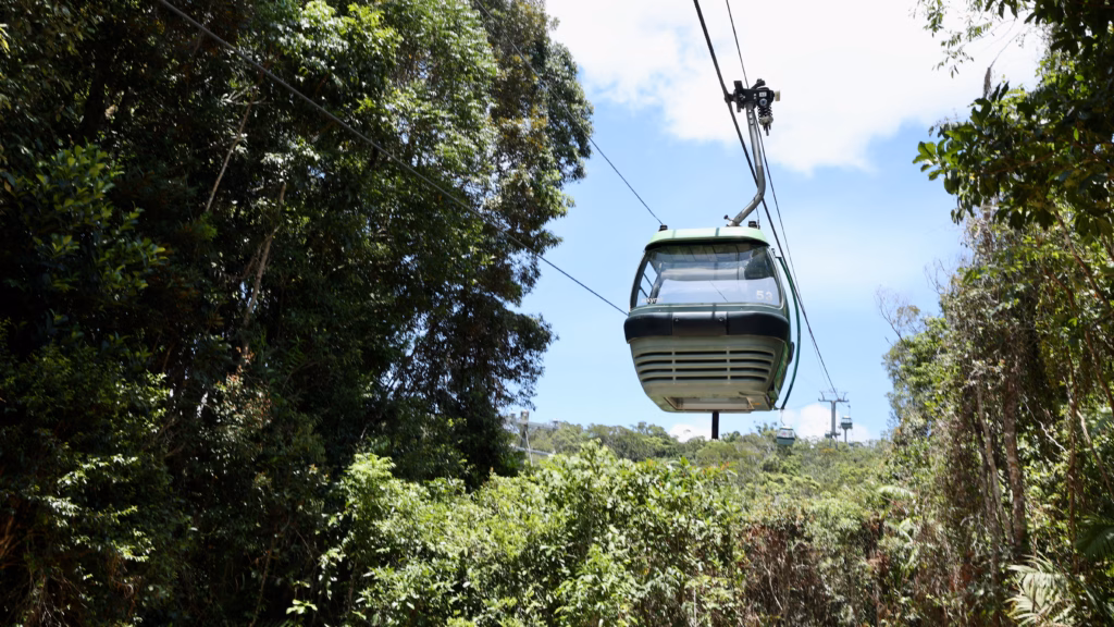 Skyrail cabin docking overhead at Barron Falls station