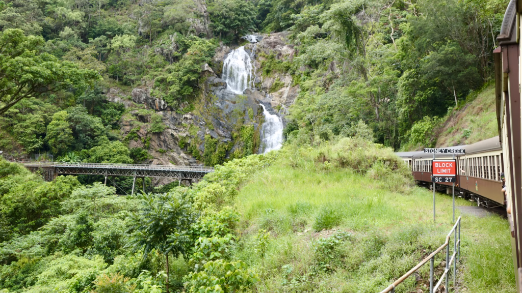Stoney Creek Falls beside Kuranda Scenic Railway trestle bridge
