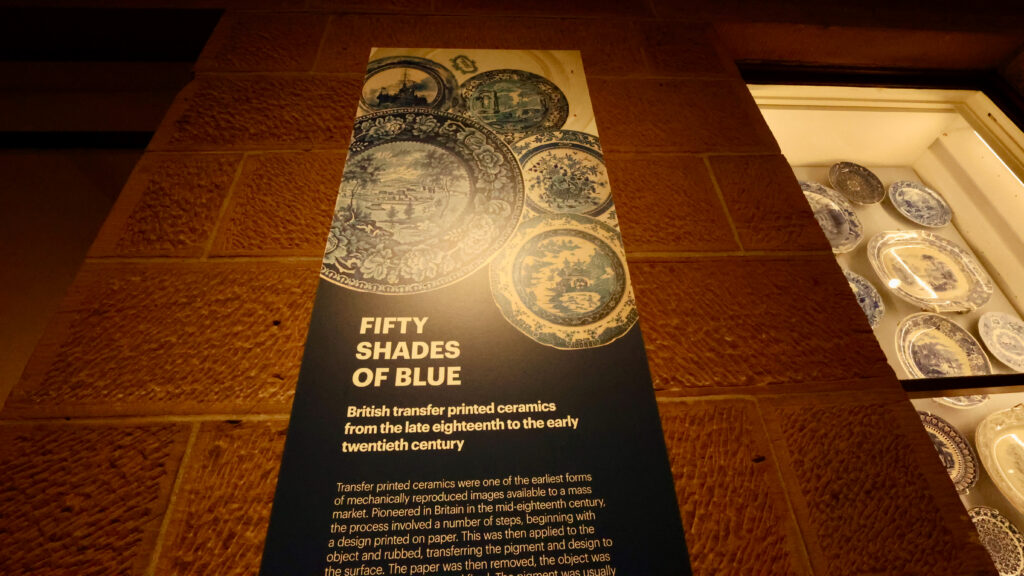 Fifty Shades of Blue ceramics exhibition display case at TMAG