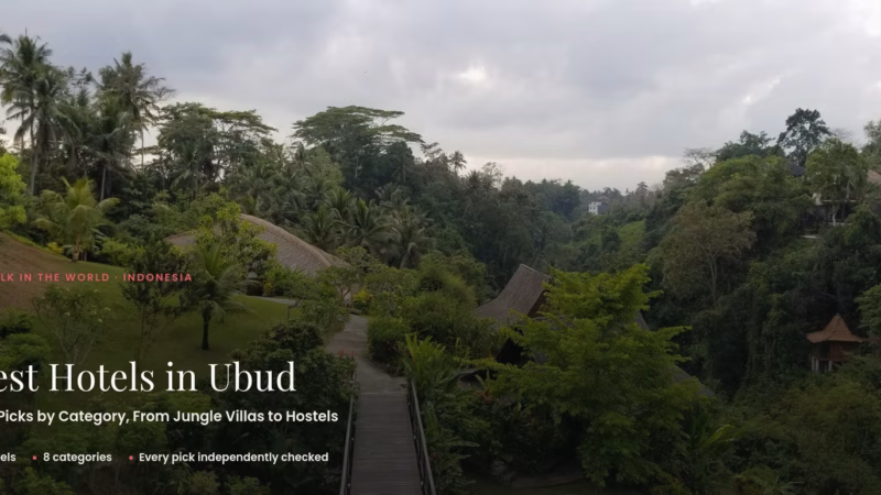 Wooden footbridge through jungle canopy leading to Amori Villas, a hotel in Ubud, Bali