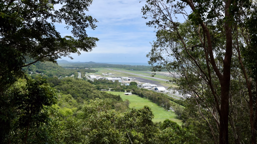 Cairns Airport runway seen through the trees