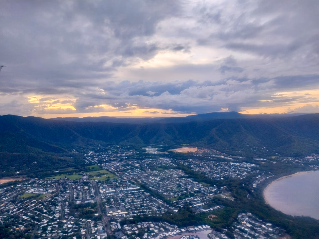 Sunset over the Barron River valley during descent into Cairns Airport
