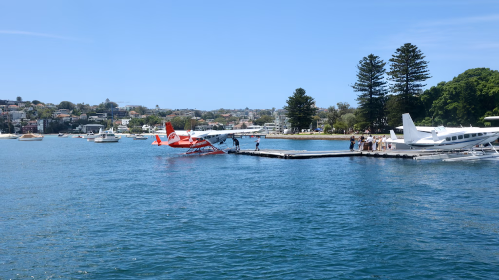 Seaplanes moored at the Rose Bay seaplane base on Sydney Harbour, seen from the F9 ferry