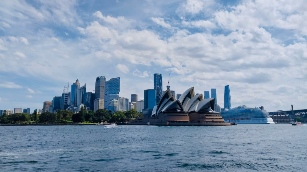 Sydney Opera House, CBD skyline and a Princess Cruises ship at the Overseas Passenger Terminal, seen from the Watsons Bay ferry