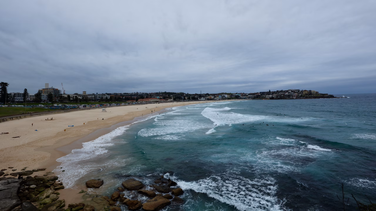 Concrete stairs on the coastal walk with Bondi Beach visible in the distance